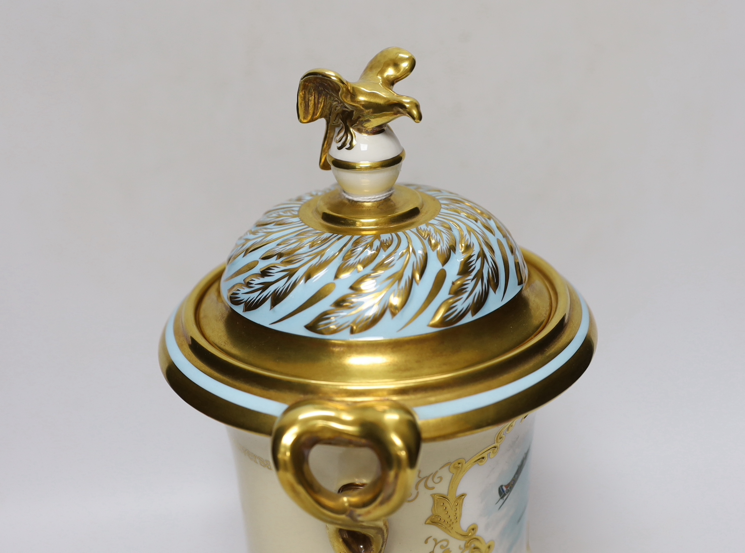 A Coalport boxed presentation urn and cover, signed M Harnett, limited edition of 50, no 40, 32cm high